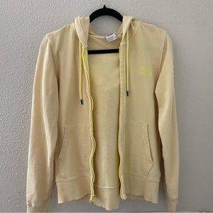 Pastel yellow vintage The North Face zip up jacket